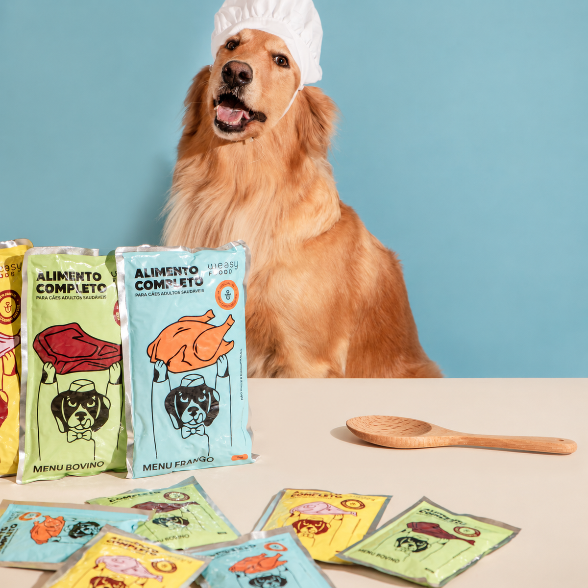 Cão com chapéu de chef ao lado das novas embalagens Weasy Food